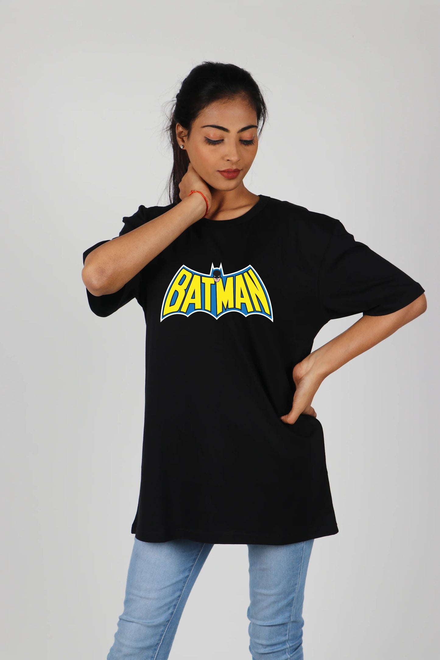 Make a bold statement with this empowering Batman T-shirt, designed for confident women