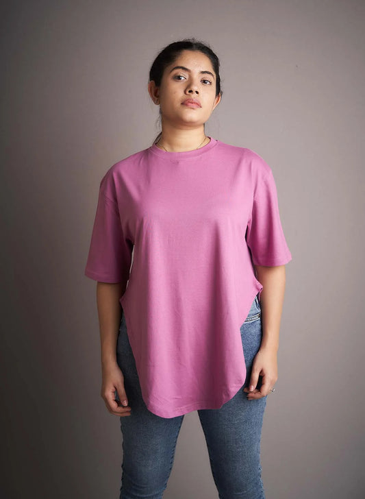 Step into lively vibes with this purple drop-cut T-shirt, a chic and trendy option for a fashionable ensemble.