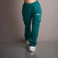  Stay cool and stylish in these green cargo pants, a trendy and comfortable choice for expressing your fashion sense.