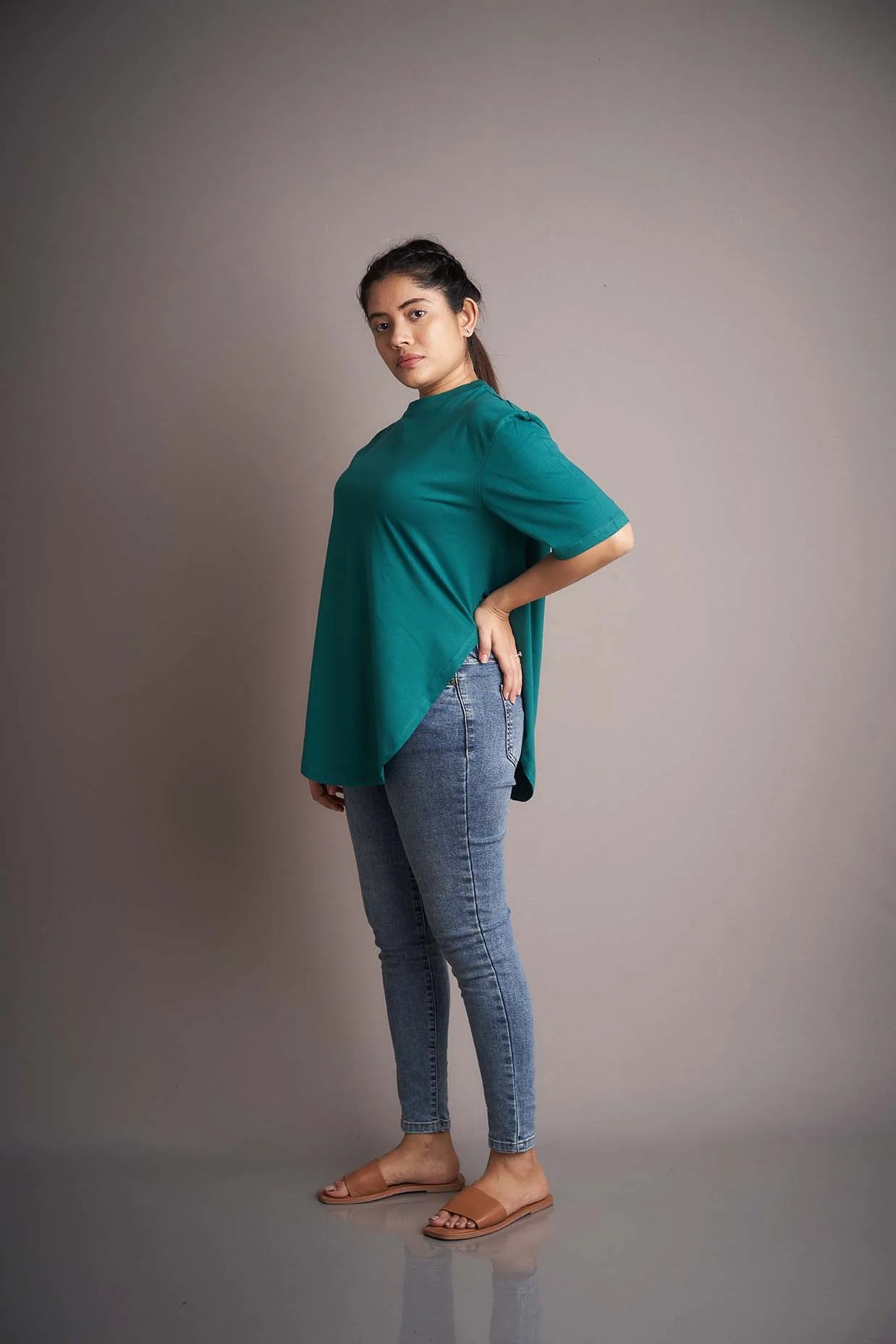  Step into lively vibes with this blue apple-cut T-shirt, a chic and trendy option for a fashionable ensemble.