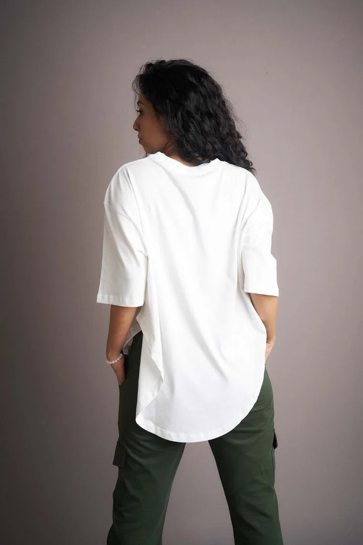 Infuse your style with white appeal in this apple-cut T-shirt, a chic and contemporary choice for fashion enthusiasts.